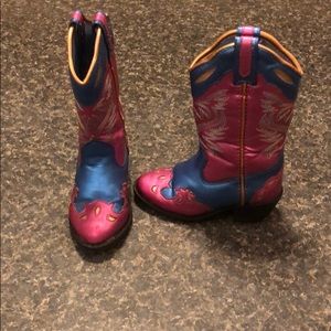 Worn girls cowboy boots